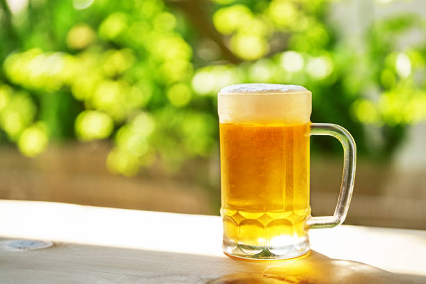 istock refreshing cold beer glasses on wooden background 1418662397
