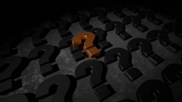 istock Gold question mark in a row on black 1418664495