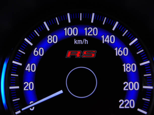 istock Close up blue speedometer manual in black background 1418677604