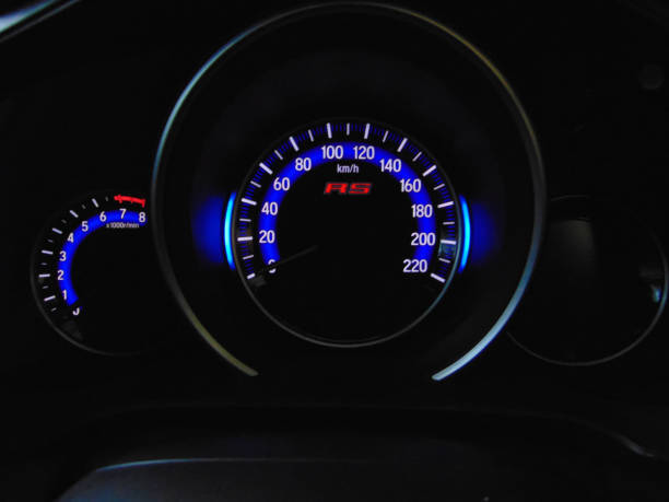 istock Close up blue speedometer manual in black background 1418677616