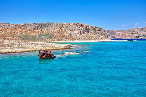 Seaside view to shipwreck at Imeri Gramvousa bay stock photo