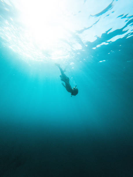 istock Little Explorer Diving into Water Moving Downwards 1418682354
