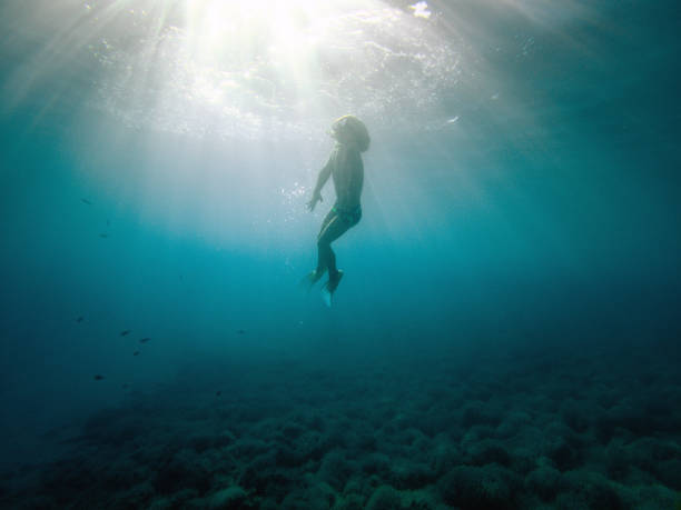 istock Fun-filled Water Day with Cute Boy Snorkeling 1418682362