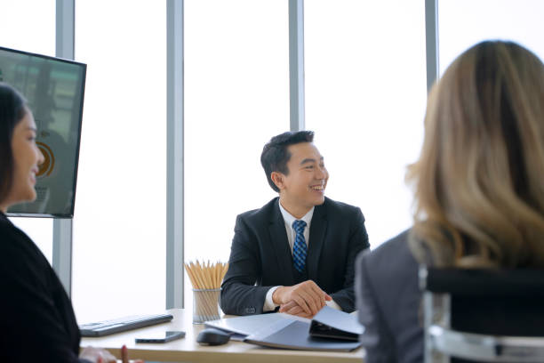 istock Employees are meeting at office. 1418684336