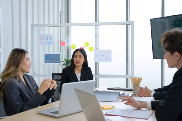 istock Employees are meeting at office. 1418684345
