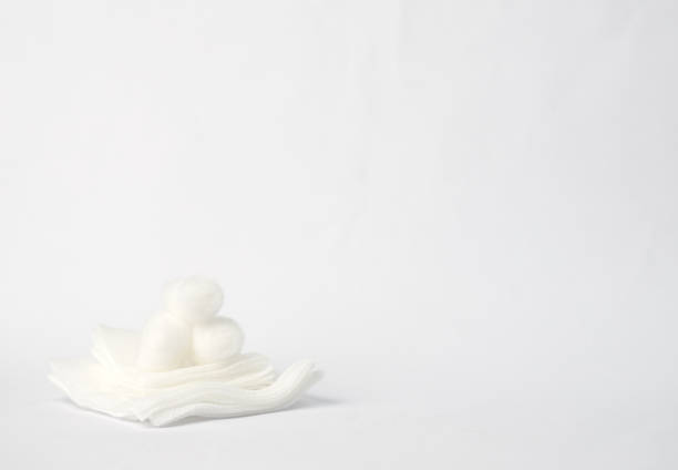 istock sterile gauze with  cotton balls on top selective focus 1418684555