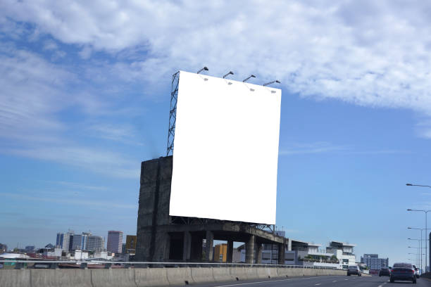 istock mock up Billboard on the building beside the elevated expressway There is a car passing by is a blank label 1418684683