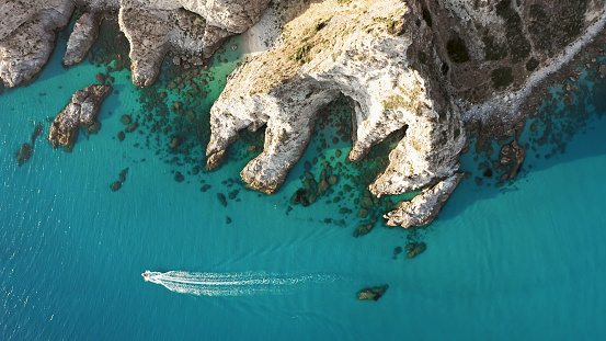 Cliff of Calabria land near the mediterranean sea in summer season. Aerial drone shoot.