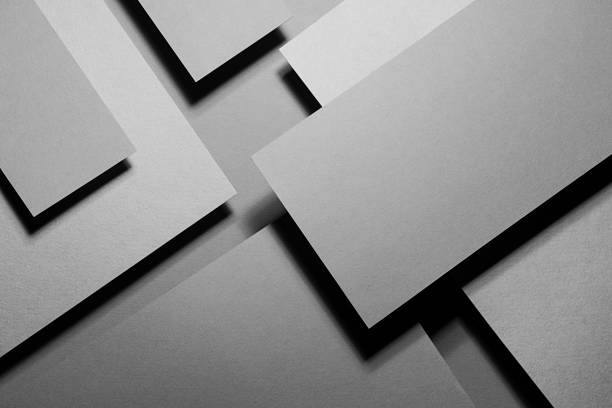 istock Grey carbon abstract geometric background with soar rectangle surfaces with corners, stripes in hard light, black shadows - monochrome style backdrop in elegant simple modern minimal style, top view. 1418688579