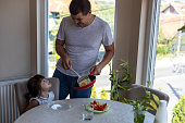 istock The father prepared the breakfast to his child. 1418688775
