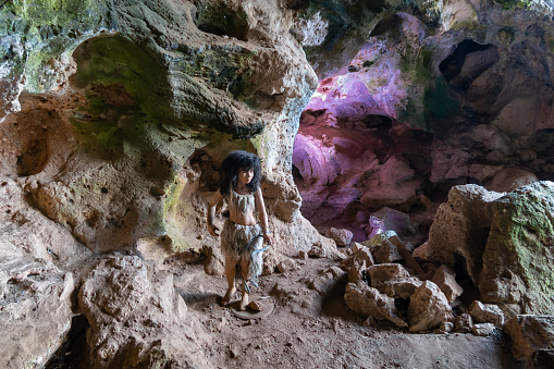 Haifa, Israel, August 20, 2022 : Exposition showing the life of a caveman in a cave in a national reserve - Nahal Mearot Nature Preserve, near Haifa, in northern Israel