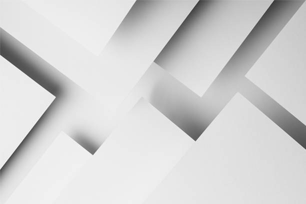istock White triangles paper surfaces fly with shadows, stripes, corners as complex abstract geometric background in strict precise elegant minimal style for business card, poster, flyer. 1418690424