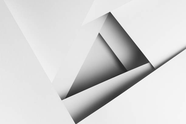 istock White abstract geometric background with crossing white flat surfaces, lines, angles, shadows and perspective as funnel in strict simple minimal modern style for business. 1418690958