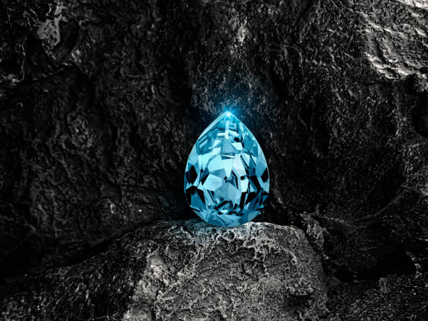 close up of elegant blue diamond on black coal background - sapphire gem topaz blue imagens e fotografias de stock