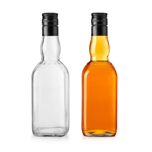 istock whiskey glass bottle with black lid 1418724328