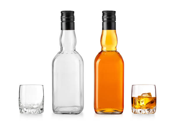 istock whiskey glass bottle with black lid 1418724331