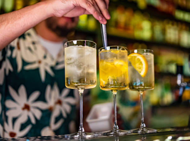 istock man hand bartender making cocktail glass in bar 1418729308