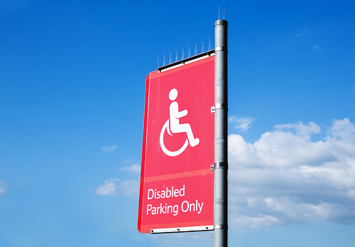 isabled parking only sign outside a house