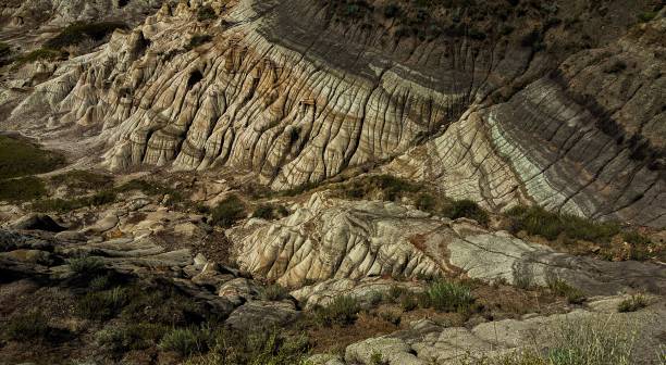 istock Dry rocky cliffs of The Drumheller Valley in Alberta, Canada 1418739818