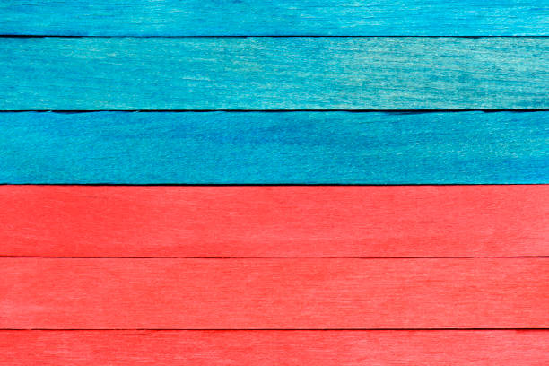 istock Bright bicolor background from red and blue wooden planks. 1418749974