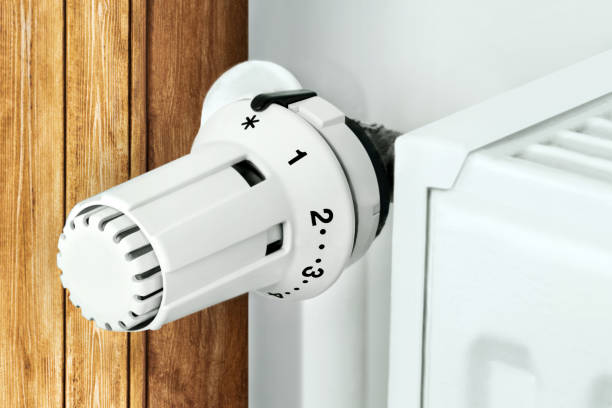 istock White heater and thermostat close up 1418759609