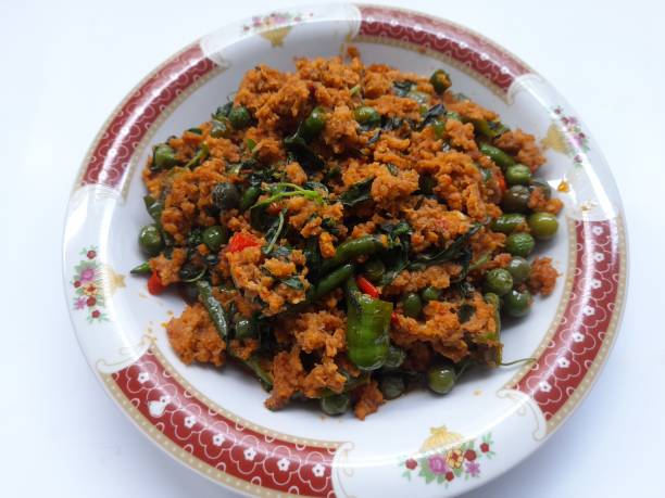 istock oncom food with basil leaves and badge on plate 1418763486
