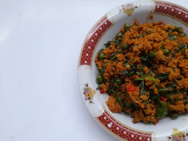 istock oncom food with basil leaves and badge on plate 1418763534