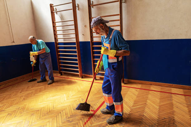 istock Janitorial service - two senior men cleaning the school 1418767159