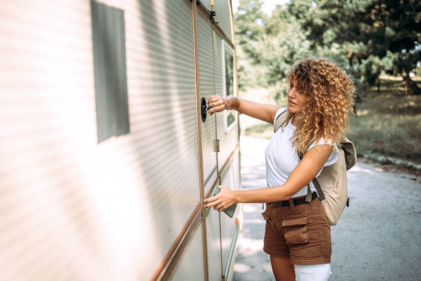 istock Woman gets into her camper 1418770126