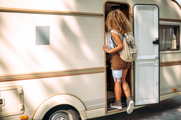 istock Woman gets into her camper 1418770374
