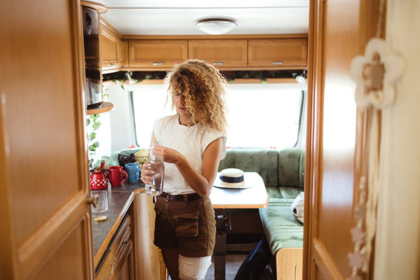 istock Woman drinking water 1418771195