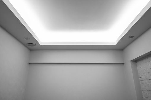 3d rendering of  ceiling and strip light in toilet room.