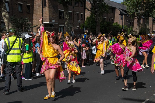 London, United Kingdom - August 28, 2022: People dancing for Notting Hill Carnival 2022