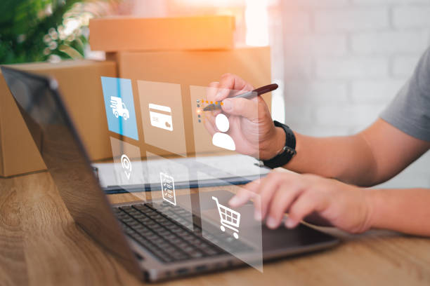 istock Delivery process on laptop virtual screen concept : Close up hand a man use a pen mark smart check box of customer review satisfaction feedback survey,Delivering parcels to customers safely in process 1418778758