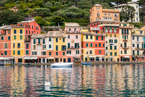 Characteristic colorful buildings lined up around the small harbour of Portofino, a very famous village on the Ligurian Riviera