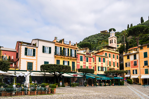 Characteristic colorful buildings overlooking the Piazzetta of Portofino, or Piazza Martiri dell'Olivetta, dedicated to 21 partisans and a civilian killed during the Second World War