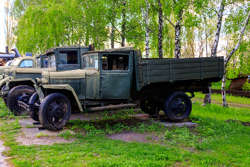 Pereyaslav, Ukraine - May 9, 2021: Rusty soviet retro trucks in Open air Museum of Folk Architecture and Folkways of Middle Naddnipryanschina in Pereyaslav, Ukraine