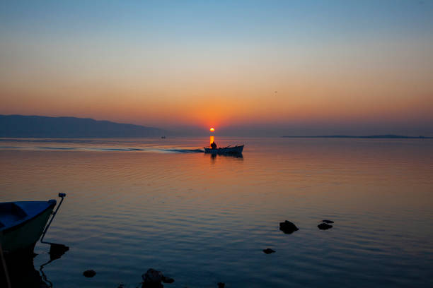 sunset and fishing boat