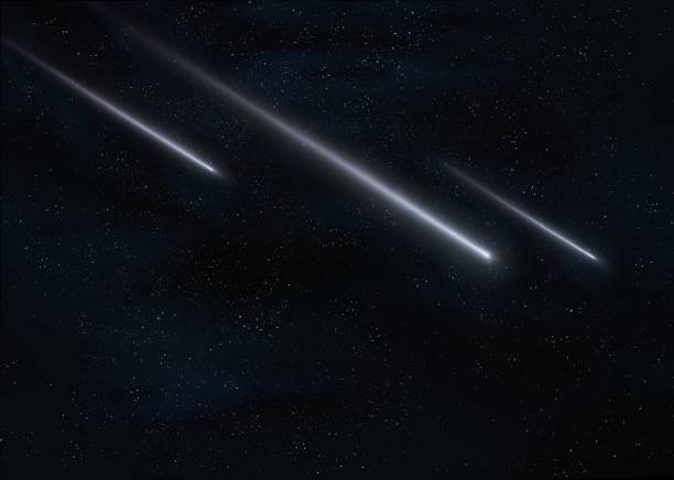istock Glowing meteors in the sky 1418798149