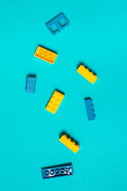 Constructor children plastic multi-colored on a pastel blue stock photo