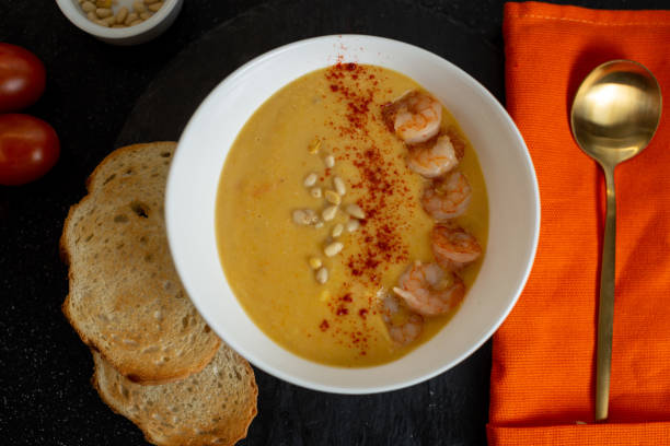 istock Pumpkin Puree Soup With Shrimp And Pine Nuts 1418800612