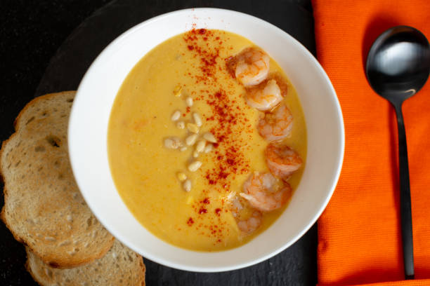 istock Pumpkin Puree Soup With Shrimp And Pine Nuts 1418800614