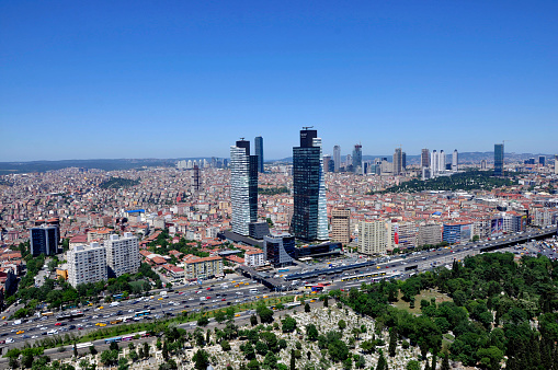 İstanbul gentrification area cityscape, Mecidiyeköy. Trump Tower building near Şişli cemetery, In front of E5 highway, at background Levent district and towers aerial photo. 2013, Mecidiyeköy, İstanbul Turkey