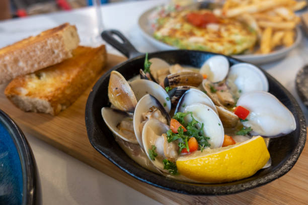 Fresh Cockle clams with wine sauce.