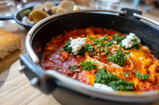 Shakshuka is a traditional Moroccan poached egg dish.