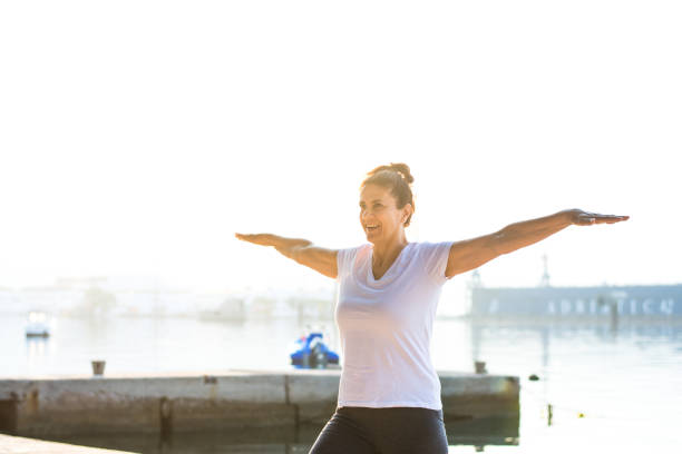 istock Woman stretching body before workout 1418807739