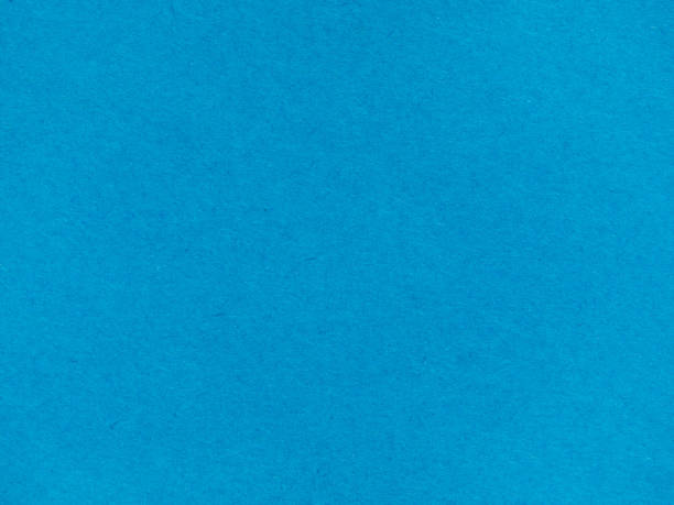 istock Textured background made of light blue kraft paper 1418810595