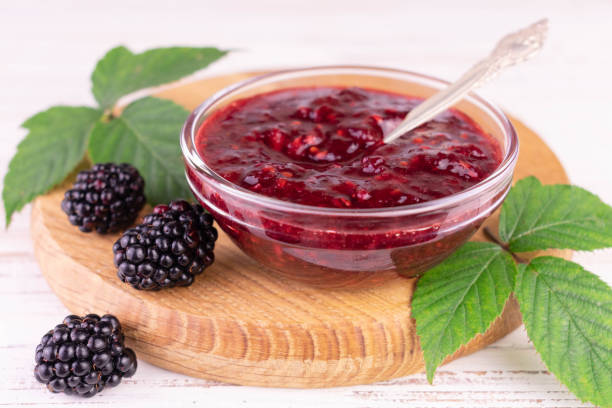 istock Blackberry jam in a glass bowl.Close-up. 1418822922