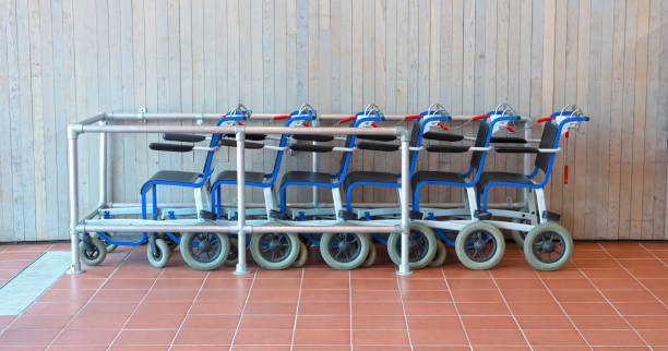 istock Row of wheel chairs, chained 1418823384
