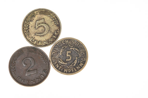 Three Old German Penny/Pfennig Coins on white background with room for copy